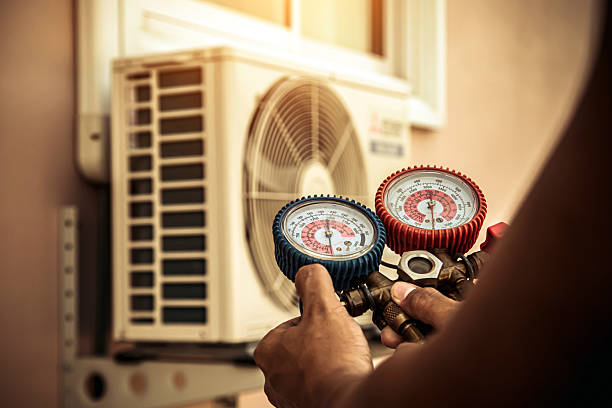 Professional Heat Pump Repair technician working in Bloomington, IN